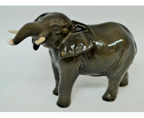 A Beswick elephant, trunk up, printed mark***PLEASE NOTE THERE IS NO BUYER'S PREMIUM ON THIS LOT, IT IS BEING SOLD AS PART OF