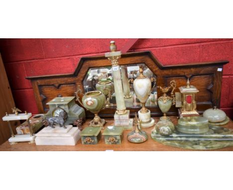 An early 20th Century onyx mantel clock, gilt metal mounts; an onyx columnar table lamp; an onyx twin handled urn, gilt metal