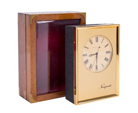 PATEK PHILIPPE-TISCHUHR Patek Philippe, Modell "Naviquartz" E1200, Nummer 1 803169, Metallguss und Messing vergoldet, Quarzwe