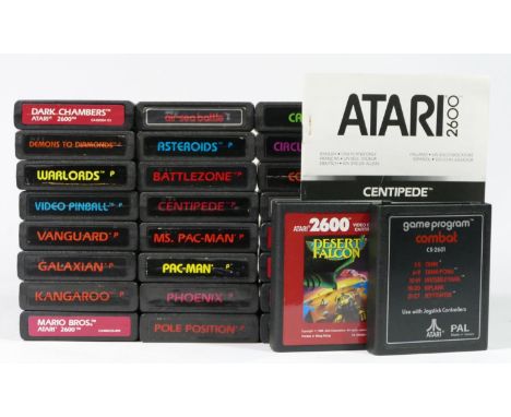 Twenty Six Atari cartridges, to include Air-Sea Battle, Asteroids, Battlezone, Centipede (with manual), Casino, Circus Atari,