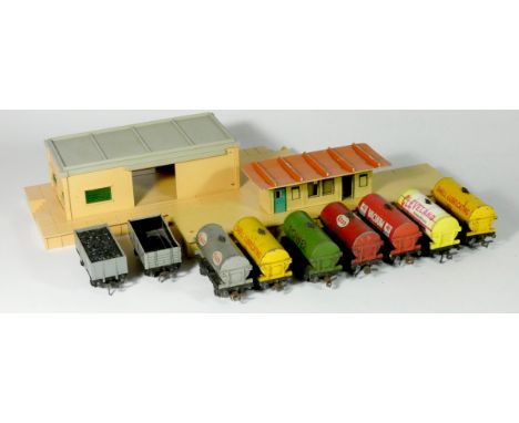 Seven Hornby Dublo tank wagons, including Shell (2), Esso, Esso Daylight, Vacuum Oil, Cleveland motor spirit and power petrol