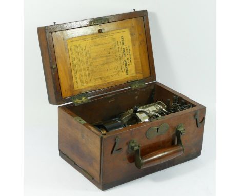 A Dobbie-Mcinnes large size steam engine indicator, with springs, rulers and diagrams taken off engines slips, lockable case 