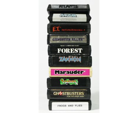 Ten Atari cartridges, to include Amidar, E.T., Frogs &amp; Flies, Atlantis, Gangster Alley, Forest, Zaxxon, Marauder, Ghostbu