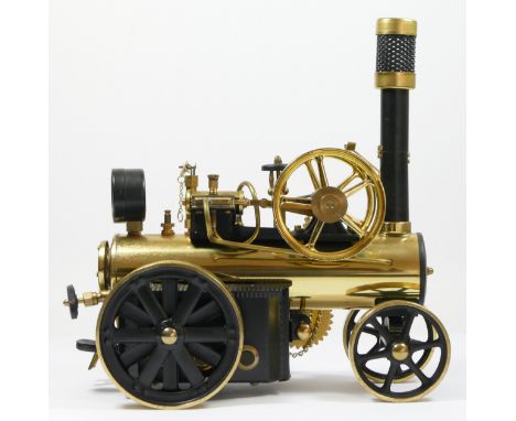 A Wilesco D430 brass live steam traction engine, unfired, with instructions, 28cm. 
