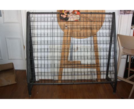 A METAL FRAMED RECORD AND CD STAND, with nine levels, 140cm long x125cm high and 46cm deep