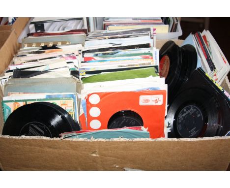 A TRAY CONTAINING OVER TWO HUNDRED AND FIFTY 7' SINGLES, including The Who, The Swinging Blue Jeans, Bob Dylan, etc