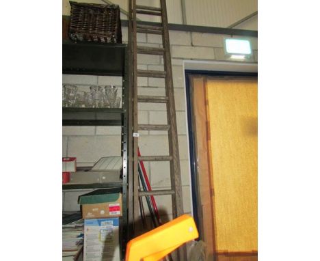 A wooden double ladder.