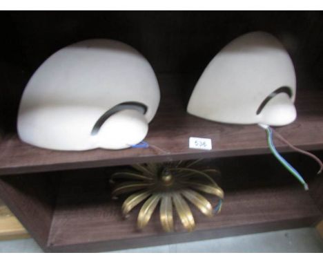 2 wall uplighters and one other light fitting.