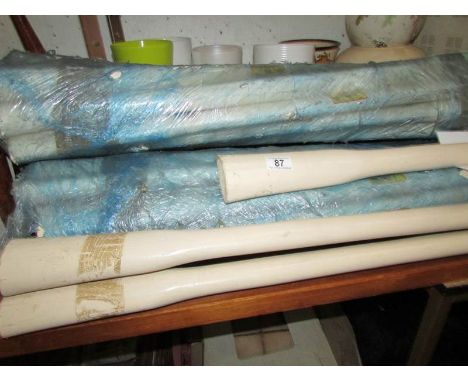 A large quantity of pick axe handles.
