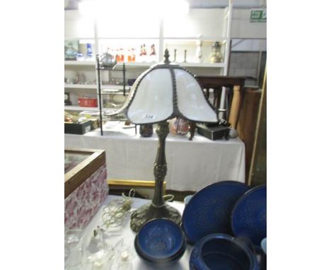 A table lamp with shade.