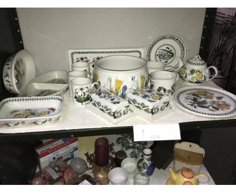 A shelf of Portmerion table ware.