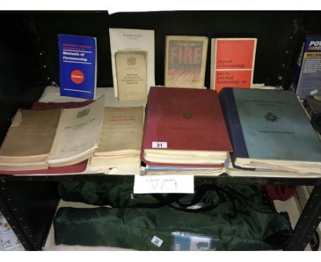 A shelf of fireman's manuals.