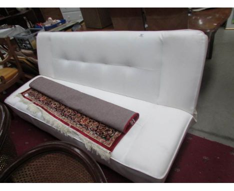 A retro style sofa bed.