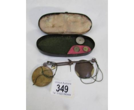 A set of vintage precious metal scales.