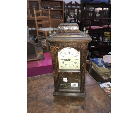 A mantel clock.