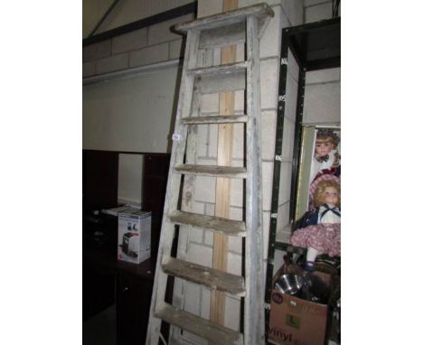 A wooden step ladder.