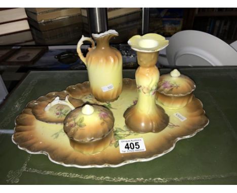 A ceramic trinket set.