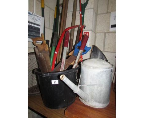A quantity of garden tools.