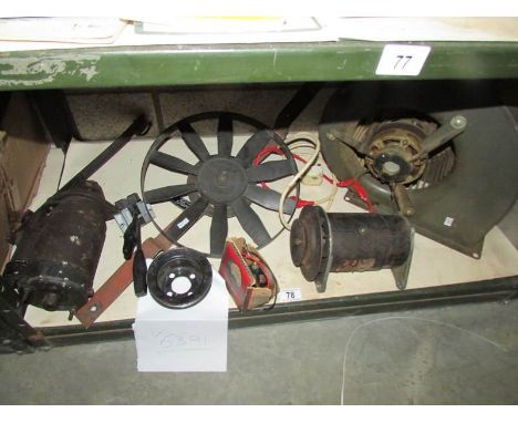 A shelf of motors, extractors etc.,