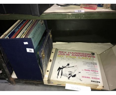 A shelf of LP records.