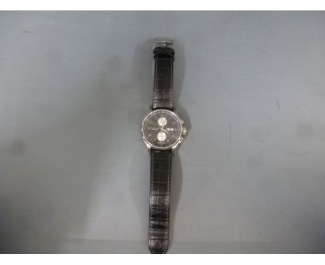 A Hamilton automatic Gentleman's wristwatch, circular black dial with Arabic numerals, two subsidiary dials day and date aper