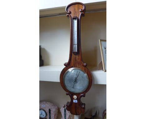 A 19th century rosewood barometer with thermometer above an 8" dial 
Condition report: In working order with a cork cap for e