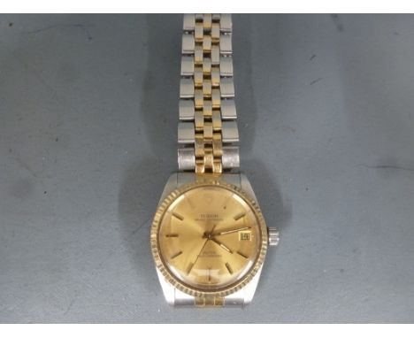 A Tudor Prince Oysterdate Automatic wrsitwatch, Champagne colour dial with baton markers, centre sweep second hand, date aper