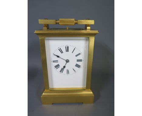 A good brass carriage clock with platform escapement repeat striking on a gong in working order - clean condition, no key