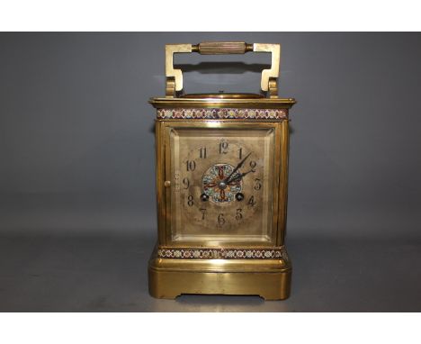 A large French Carriage clock 19th century eight day movement, striking hours and half hours,with a aneroid barometer to top 