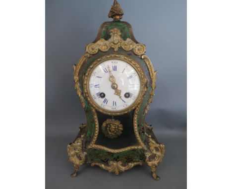 A late 19th century French Boulle work mantel clock with green stained tortoiseshell body, the Japy Freres movement stamped 1