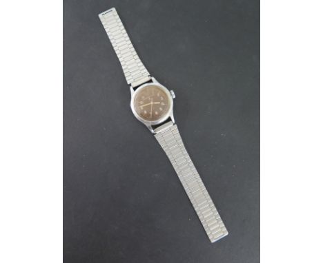 An IWC Military issue gents wristwatch broad arrow GB/346 501/51 1951 Issue, IWC movement 1149501 black dial with baton and A