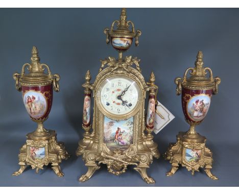 A 20th century Lancini ormolu and porcelain clock garniture set striking on two bells - Height 42cm - good working order