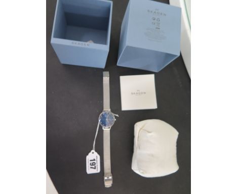 A virtually un worn ladies stainless steel Skagen quartz watch, blue dial set with crystal markers - original box and papers,