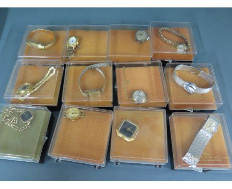 Twelve assorted ladies manual wind wristwatches - all working