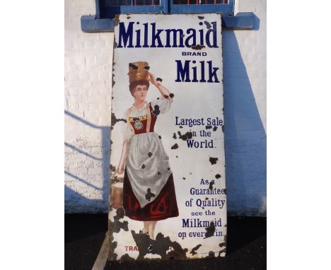 A very large Milkmaid Milk part pictorial enamel sign, 43 x 94 1/2". 