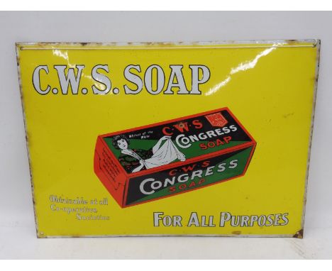 A C.W.S Congress Soap pictorial packet convex enamel sign, 21 1/2 x 15 1/2".