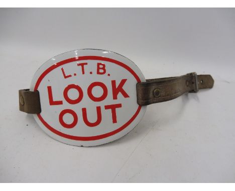 A London Transport Board 'Look Out' oval enamel armband.