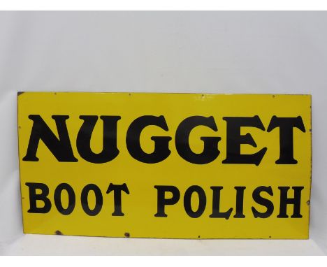 A Nugget Boot Polish rectangular enamel sign in near mint condition, 48 x 24". 