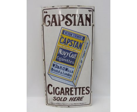 A Capstan Cigarettes Sold Here pictorial packet enamel sign, 18 x 36 1/4". 