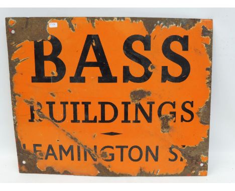 A small Bass Buildings enamel sign, 18 1/2 x 15". 