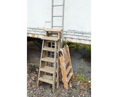 THREE WOODEN STEP LADDERS, and an aluminium single ladder (4)
