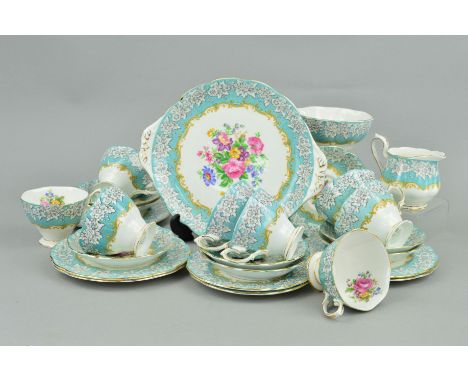 ROYAL ALBERT 'ENCHANTMENT' TEAWARES, to include cake plate, milk jug, sugar bowl, eight cups, eight saucers and seven side pl