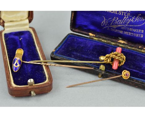 A COLLECTION OF EARLY 20TH CENTURY STICK PINS, to include a cased Masonic enamelled shoe, stamped '9ct', a gold plated coral,