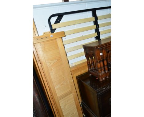 A LIGHT OAK 5' BED FRAME