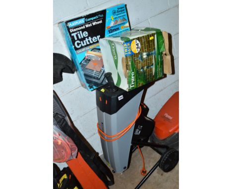 A TITAN RAPID SHREDDER,  boxed pair of outdoor lanterns, a Plasplug tile cutter and a panasonic surround sound with DVD playe