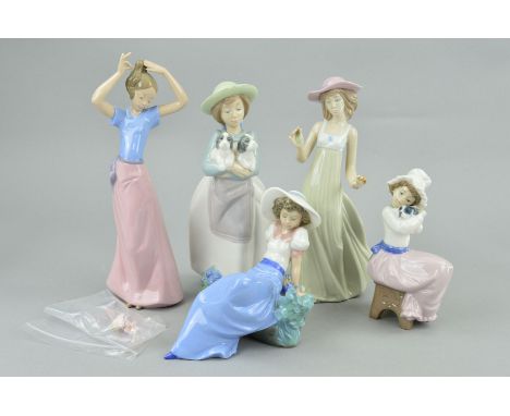 FIVE NAO FIGURES, to include 'Listening to Birds Song', 'What an Armful' (chip to hat), a girl putting hair up, etc (some reg