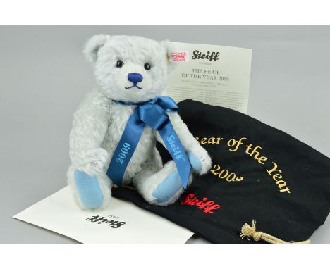 A LIMITED EDITION STEIFF 'BEAR OF THE YEAR 2009', light blue mohair, with ribbon, No.00263/1500, No.663062, with growler, hei