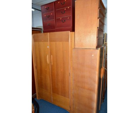 A LIGHT OAK AVALON TWO PIECE BEDROOM SUITE, comprising of two wardrobes and a teak chest of drawers (3)