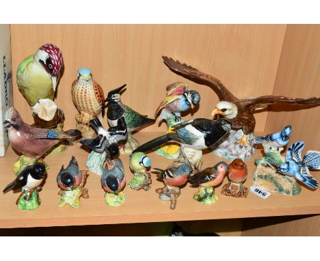 A GROUP OF BESWICK BIRDS, 'American Blue Jays' No.925 (reglued), 'Chickadee' No.929 (wing reglued), Robin No.980B (chipped be