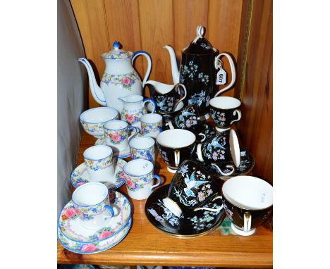 ROYAL ALBERT 'ORIENTAL' COFFEE SET, coffee pot, cream jug, sugar bowl, six cups (one hairline) and six saucers, together with